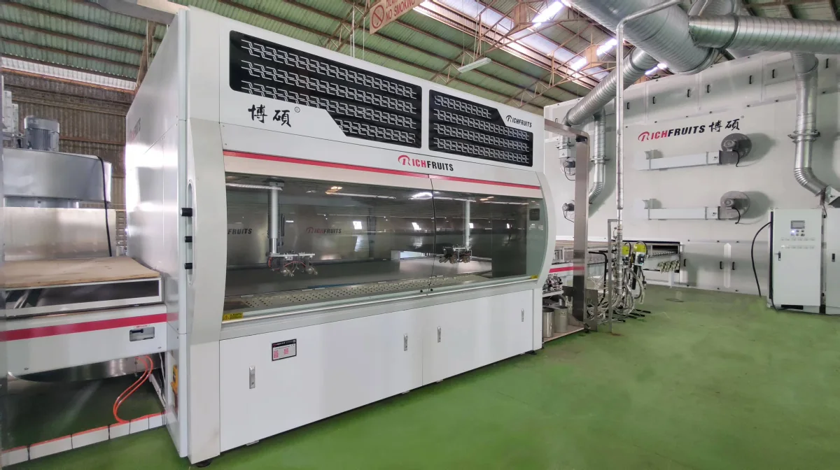 Automatic spray booth for water-based wood-product finishing